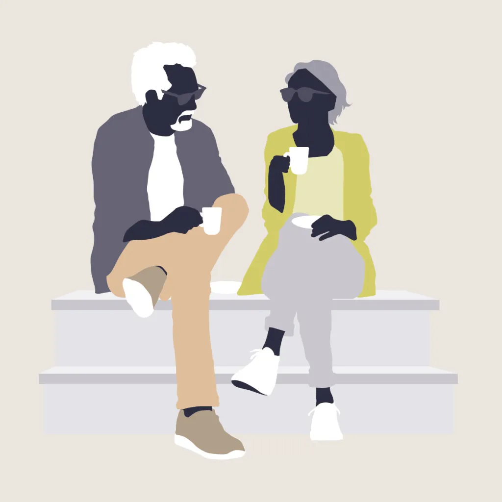 Een man en vrouw zitten op een trap. Ze hebben allebei een mok met koffie vast en praten met elkaar.